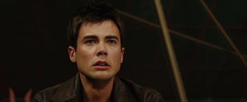Movie still from “Ghost Rider” (2007), directed by Mark Steven Johnson – A person wearing a brown jacket; Close Up shot, Over the shoulder angle