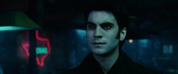 Movie still from “Ghost Rider” (2007), directed by Mark Steven Johnson – A person wearing a suit and tie; Close Up shot, Low angle