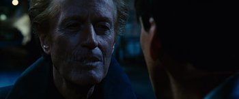 Movie still from “Ghost Rider” (2007), directed by Mark Steven Johnson – An older man is talking to a younger man; Close Up shot, Over the shoulder angle