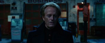 Movie still from “Ghost Rider” (2007), directed by Mark Steven Johnson – A person wearing a coat; Close Up shot, Low angle