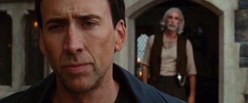 Movie still from “Ghost Rider” (2007), directed by Mark Steven Johnson – A person looking at the camera; Close Up shot, Over the shoulder angle