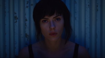 Movie still from “Ghost in the Shell” (2017), directed by Rupert Sanders – A person with short black hair; Close Up shot, Low angle
