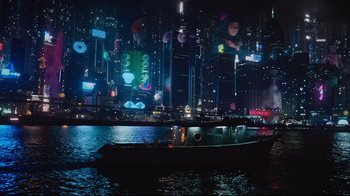 Movie still from “Ghost in the Shell” (2017), directed by Rupert Sanders – A boat floating on a body of water at night; Extreme Wide shot, High angle