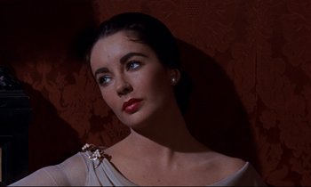 Movie still from “Giant” (1956), directed by George Stevens – A person wearing a dress; Close Up shot, High angle