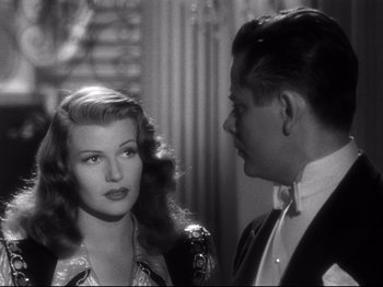 Movie still from “Gilda” (1946), directed by Charles Vidor – A man and a woman talking to each other; Close Up shot, Over the shoulder angle