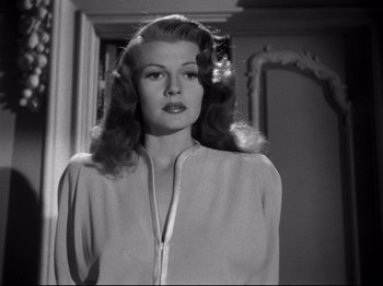 Movie still from “Gilda” (1946), directed by Charles Vidor – A black - and - white photo of rita hayworth; Close Up shot, Low angle