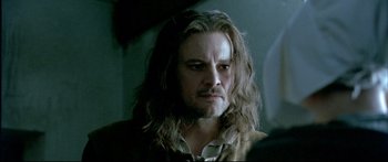 Movie still from “Girl with a Pearl Earring” (2003), directed by Peter Webber – A person with long hair; Close Up shot, Over the shoulder angle