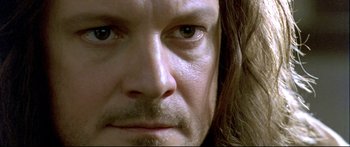 Movie still from “Girl with a Pearl Earring” (2003), directed by Peter Webber – A person with long hair; Close Up shot, High angle