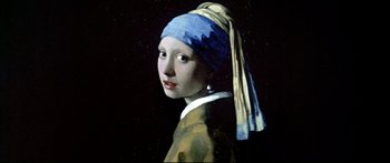 Movie still from “Girl with a Pearl Earring” (2003), directed by Peter Webber – A painting of a young girl with a pearl earring; Close Up shot, Low angle
