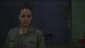Movie still from “Girlfight” (2000), directed by Karyn Kusama – A woman in a green shirt is looking at the camera; Close Up shot, Low angle