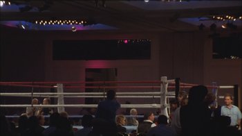 Movie still from “Girlfight” (2000), directed by Karyn Kusama – A crowd of people watching a boxing match; Extreme Wide shot, High angle