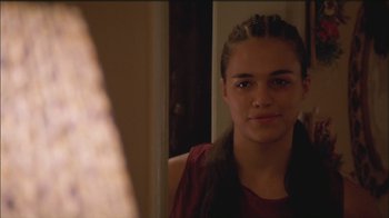 Movie still from “Girlfight” (2000), directed by Karyn Kusama – A young girl looking into a mirror in front of a wall; Close Up shot, Over the shoulder angle