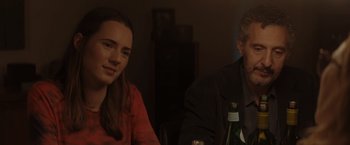 Movie still from “Gloria Bell” (2018), directed by Sebastián Lelio – A man and a woman sitting at a dinner table; Close Up shot, Over the shoulder angle