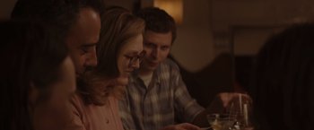 Movie still from “Gloria Bell” (2018), directed by Sebastián Lelio – A man and a woman sitting at a dinner table; Close Up shot, Over the shoulder angle
