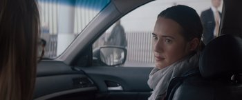 Movie still from “Gloria Bell” (2018), directed by Sebastián Lelio – A woman sitting in the driver's seat of a car; Close Up shot, Over the shoulder angle