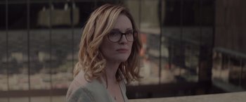 Movie still from “Gloria Bell” (2018), directed by Sebastián Lelio – A person wearing glasses; Close Up shot, Over the shoulder angle