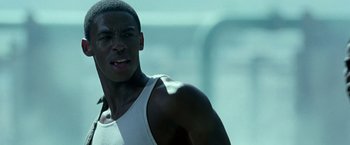 Movie still from “Glory Road” (2006), directed by James Gartner – A person wearing a tank top; Close Up shot, Low angle
