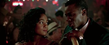 Movie still from “Glory Road” (2006), directed by James Gartner – A man and a woman are looking at each other; Close Up shot, Over the shoulder angle