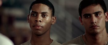 Movie still from “Glory Road” (2006), directed by James Gartner – A person looking at the camera; Close Up shot, Over the shoulder angle