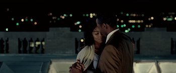 Movie still from “Glory Road” (2006), directed by James Gartner – A man and a woman are dancing together; Medium shot, Over the shoulder angle
