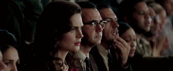 Movie still from “Glory Road” (2006), directed by James Gartner – A group of men and women sitting next to each other; Close Up shot, Low angle