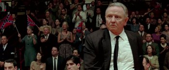 Movie still from “Glory Road” (2006), directed by James Gartner – A crowd of people watching a basketball game in progress; Medium shot, Low angle