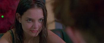 Movie still from “Go” (1999), directed by Doug Liman – A person with wet hair; Close Up shot, Over the shoulder angle