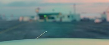 Movie still from “Go” (1999), directed by Doug Liman – A match stick on a field; Extreme Close Up shot, High angle