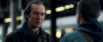 Movie still from “Goal! The Dream Begins” (2005), directed by Michael Winterbottom – A person wearing a jacket; Close Up shot, Over the shoulder angle