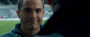 Movie still from “Goal! The Dream Begins” (2005), directed by Michael Winterbottom – A man's face in front of another man; Close Up shot, Over the shoulder angle