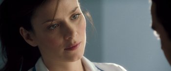 Movie still from “Goal! The Dream Begins” (2005), directed by Michael Winterbottom – A woman's face in a white shirt; Close Up shot, Low angle