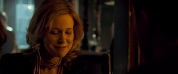 Movie still from “Goal! The Dream Begins” (2005), directed by Michael Winterbottom – A person sitting in a room; Close Up shot, Over the shoulder angle