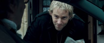 Movie still from “Goal! The Dream Begins” (2005), directed by Michael Winterbottom – A person with blond hair; Close Up shot, Over the shoulder angle