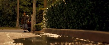 Movie still from “Goal! The Dream Begins” (2005), directed by Michael Winterbottom – A view of a garden from the ground level; Wide shot, High angle