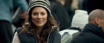 Movie still from “Goal! The Dream Begins” (2005), directed by Michael Winterbottom – A person wearing a hat; Close Up shot, Over the shoulder angle