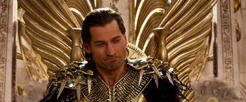 Movie still from “Gods of Egypt” (2016), directed by Alex Proyas – A person wearing a costume; Close Up shot, Over the shoulder angle