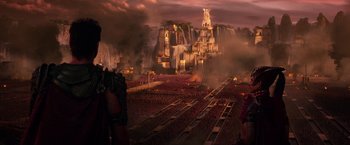 Movie still from “Gods of Egypt” (2016), directed by Alex Proyas – An image of a train going down the tracks in the middle of the night; Extreme Wide shot, High angle
