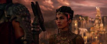 Movie still from “Gods of Egypt” (2016), directed by Alex Proyas – A woman with a crown on her head; Close Up shot, Over the shoulder angle