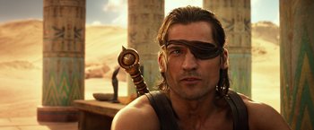 Movie still from “Gods of Egypt” (2016), directed by Alex Proyas – A person holding a weapon; Close Up shot, Over the shoulder angle