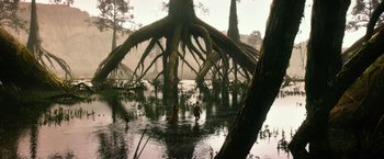 Movie still from “Gods of Egypt” (2016), directed by Alex Proyas – A group of people swimming in a body of water near trees; Extreme Wide shot, Low angle