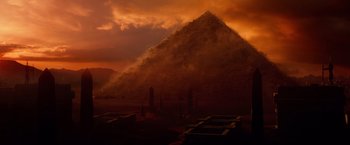 Movie still from “Gods of Egypt” (2016), directed by Alex Proyas – A large pyramid in the middle of the desert; Extreme Wide shot, Low angle