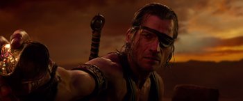 Movie still from “Gods of Egypt” (2016), directed by Alex Proyas – A person holding a sword; Close Up shot, Over the shoulder angle