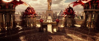 Movie still from “Gods of Egypt” (2016), directed by Alex Proyas – An image of an ancient city with a statue in the center; Extreme Wide shot, High angle