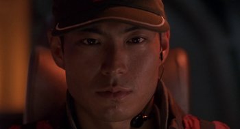 Movie still from “Godzilla vs. Destoroyah” (1995), directed by Ishirô Honda – A person wearing a hat; Close Up shot, Low angle