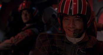 Movie still from “Godzilla vs. Destoroyah” (1995), directed by Ishirô Honda – A man wearing a helmet sitting next to another man in a helmet; Close Up shot, Low angle
