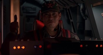 Movie still from “Godzilla vs. Destoroyah” (1995), directed by Ishirô Honda – A man wearing a baseball cap and a jacket; Close Up shot, Low angle