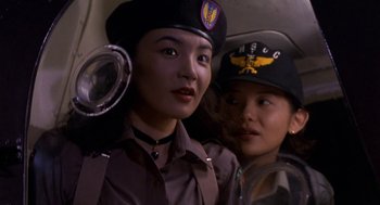 Movie still from “Godzilla vs. Destoroyah” (1995), directed by Ishirô Honda – Two women in military uniforms in a car; Close Up shot, Low angle