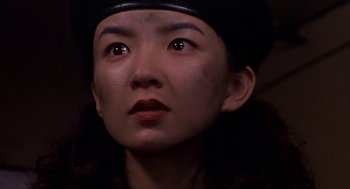 Movie still from “Godzilla vs. Destoroyah” (1995), directed by Ishirô Honda – A person wearing a hat; Close Up shot, Low angle