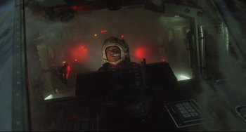 Movie still from “Godzilla vs. Mechagodzilla II” (1993), directed by Kazuki Ômori – A man wearing a space suit and a helmet; Wide shot, Low angle