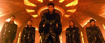 Movie still from “Godzilla: Final Wars” (2004), directed by Koji Hashimoto – A group of people standing next to each other; Medium shot, Low angle